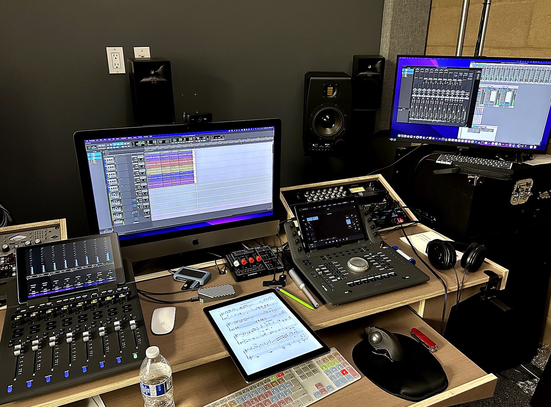 Our studio control room with recording monitors, mixing console and audio equipment