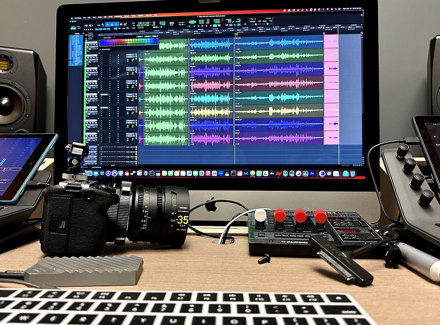 Camera and audio editing equipment at our production desk
